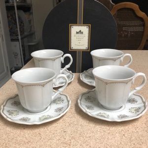 Set of 4 teacups and saucers